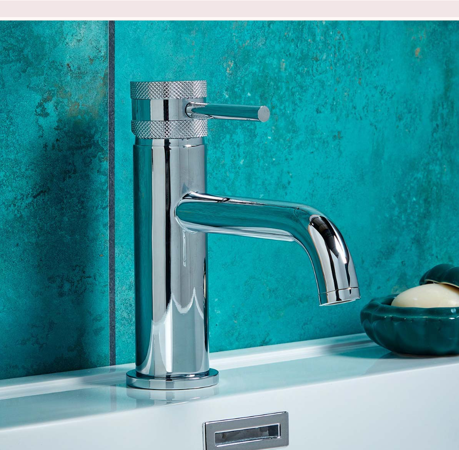 Chrome bathroom taps and shower brassware