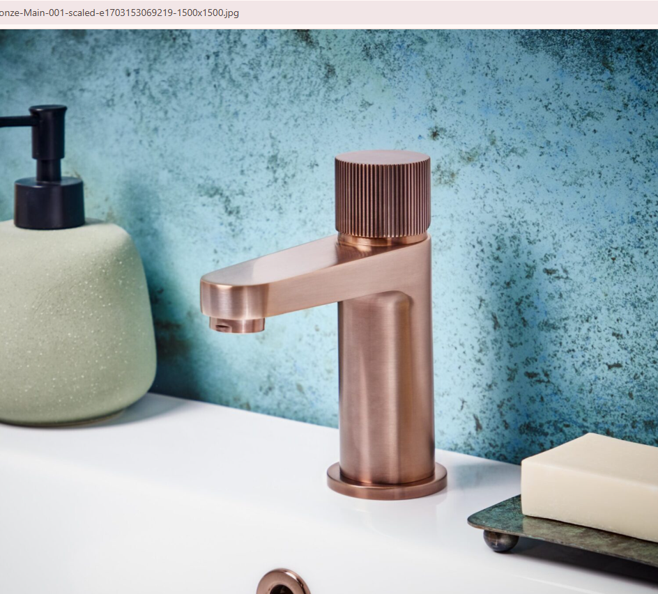 Brushed bronze bathroom taps and shower brassware